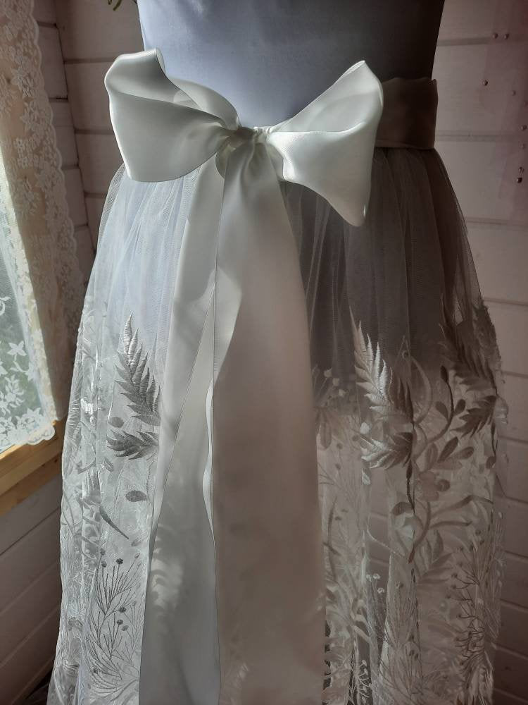 Floral bridal overskirt in off-white. Embroidered tulle with trailing flowers and leaves. Winter Woodland over skirt.