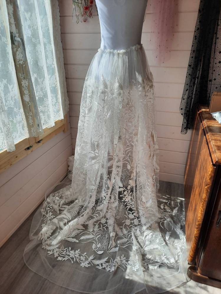 Floral bridal overskirt in off-white. Embroidered tulle with trailing flowers and leaves. Winter Woodland over skirt.