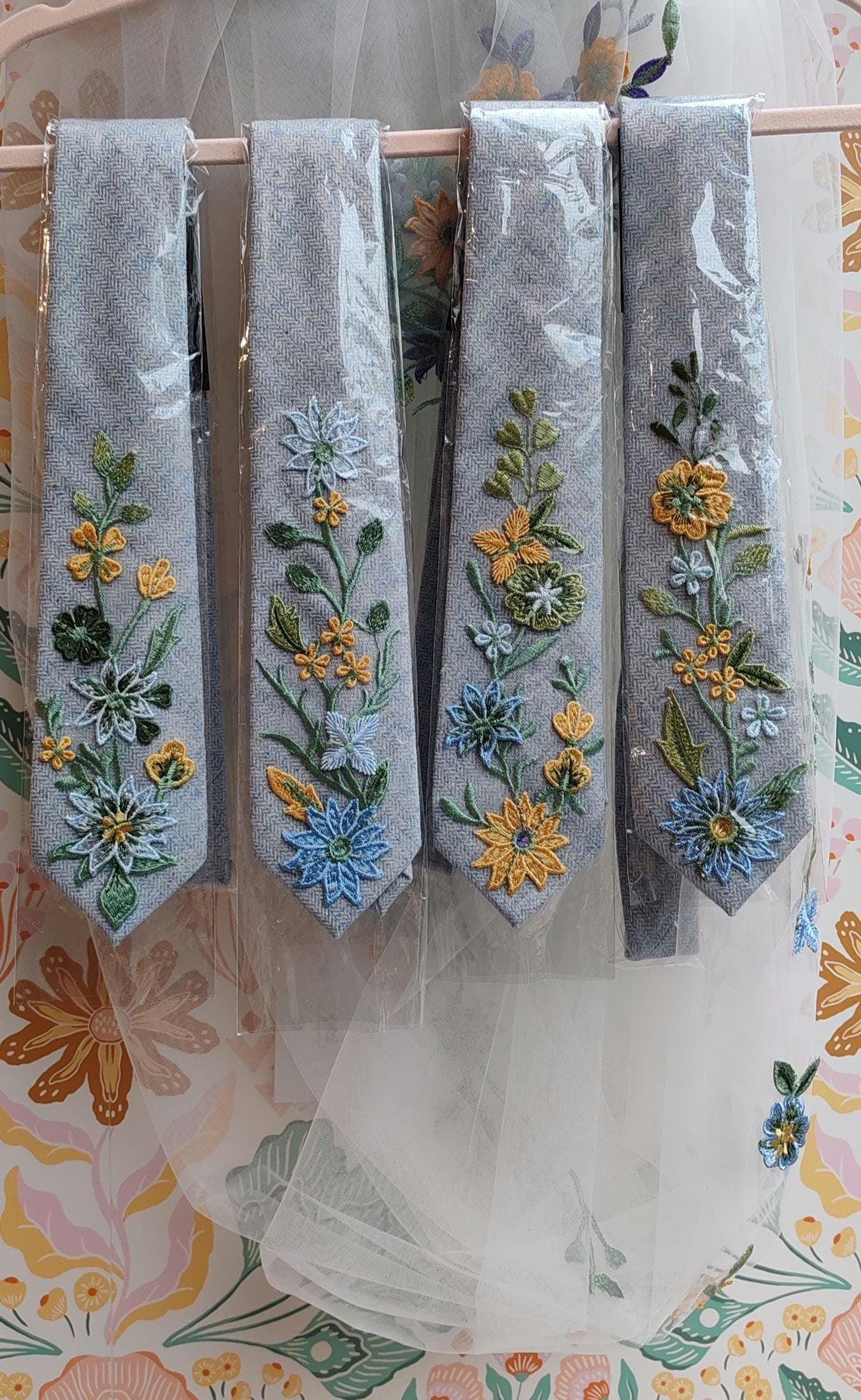 Floral tie. Matching groomsman tie. Floral tie matching brides veil.