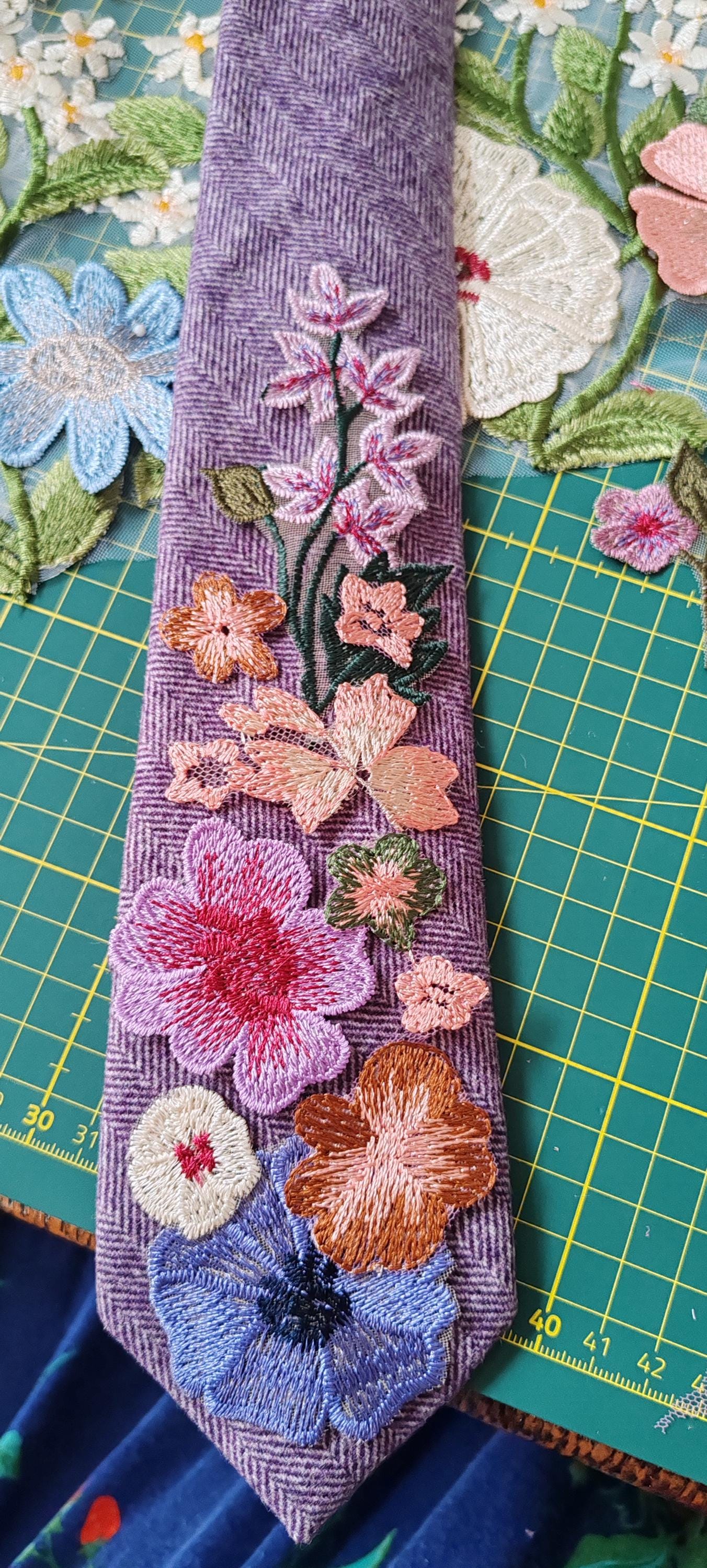 Floral tie. Matching groomsman tie. Floral tie matching brides veil.
